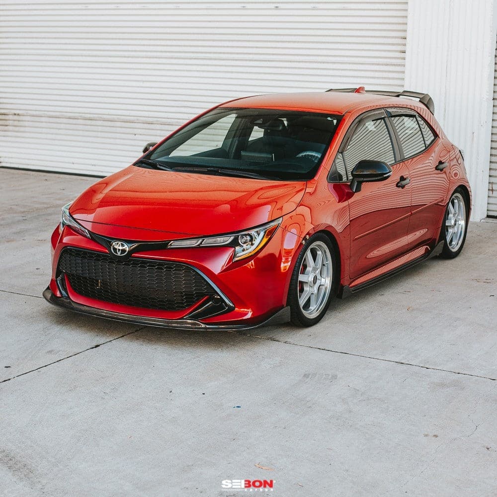 Seibon 19-21 Toyota Corolla Hatchback MB-Style Carbon Fiber Front Lip